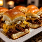 Home Cook, taken with iPhone 15 Pro. Close-up slight angle of freshly prepared Loaded Philly Cheesesteak Sliders on white plate. Rich inviting --ar 4:3 --style raw --s 230
