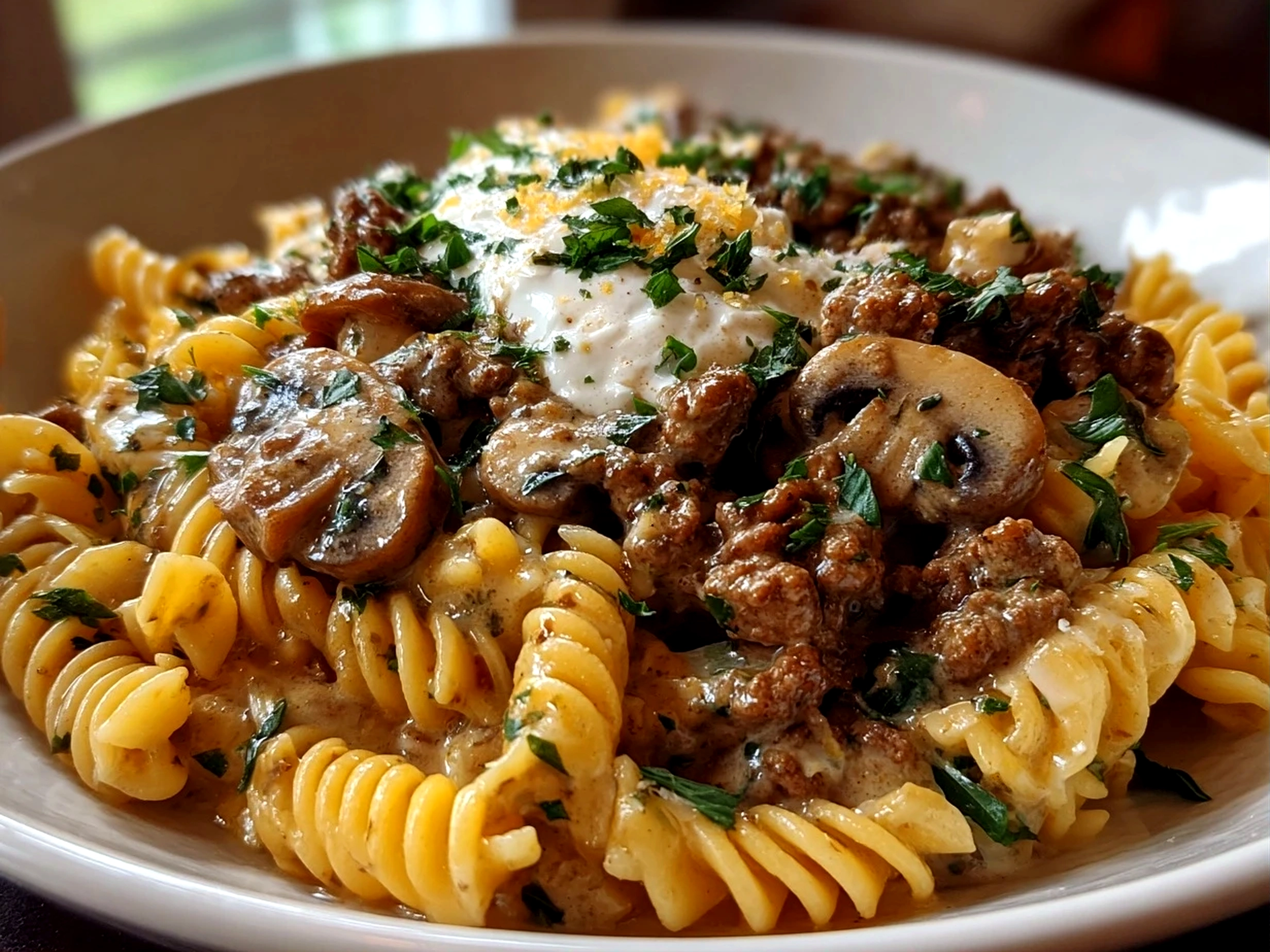 Home Cook, taken with iPhone 15 Pro. Close-up slight angle of comforting Ground Beef Stroganoff on white plate. Hearty comforting --ar 4:3 --style raw --s 235